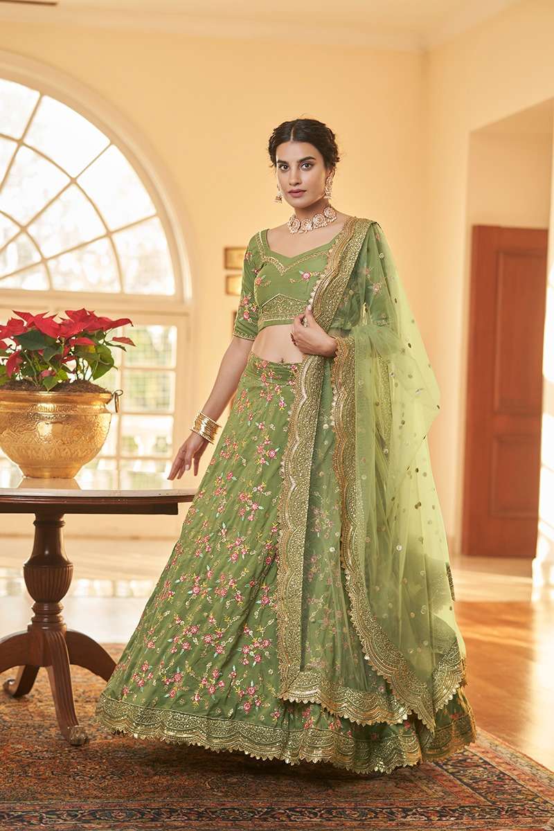 Grab this designer silk lehenga choli in pista-green color paired with  contrasting dark pink colored dupatta.… | Designer lehenga choli, Silk  lehenga, Lehenga choli