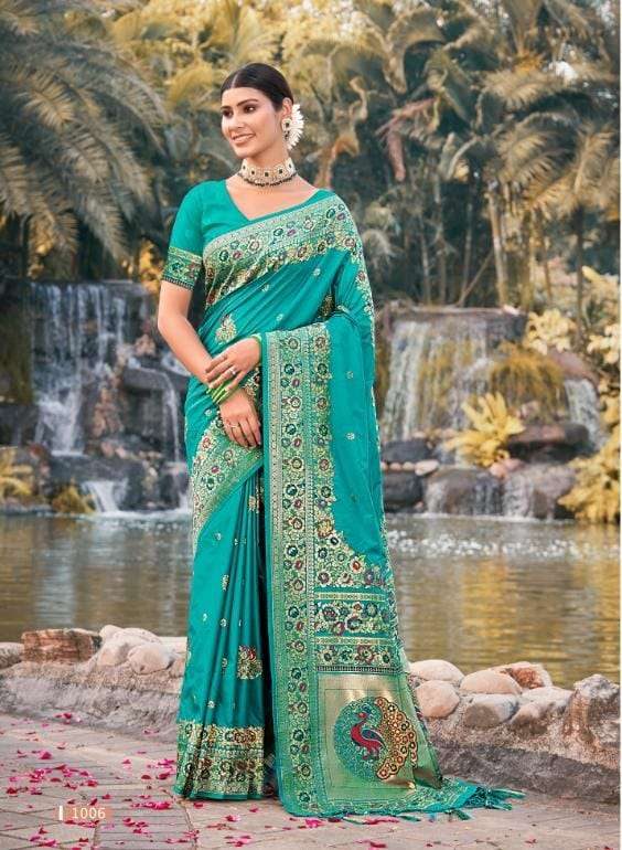 Dark green color paithani silk saree with golden zari weaving work