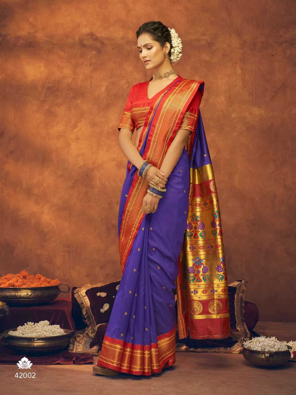 Navy blue color paithani silk saree with zari weaving work